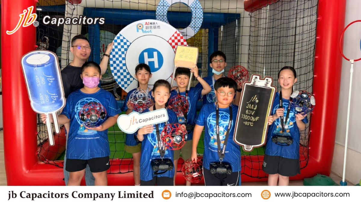 Young drone soccer students supported by jb Capacitors during hands-on training and competition preparation