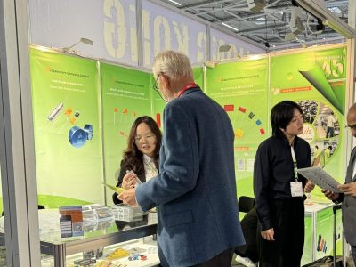 Industry professionals receiving electronic components consultation and product information at jb Capacitors electronica 2024 booth